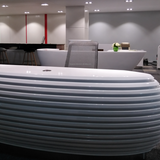 LuxuraFlair: Glossy Black Bamboo Fluted Reception Desk with Velvet Accents