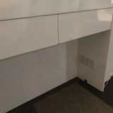 LuxuraFlair: Glossy Black Bamboo Fluted Reception Desk with Velvet Accents